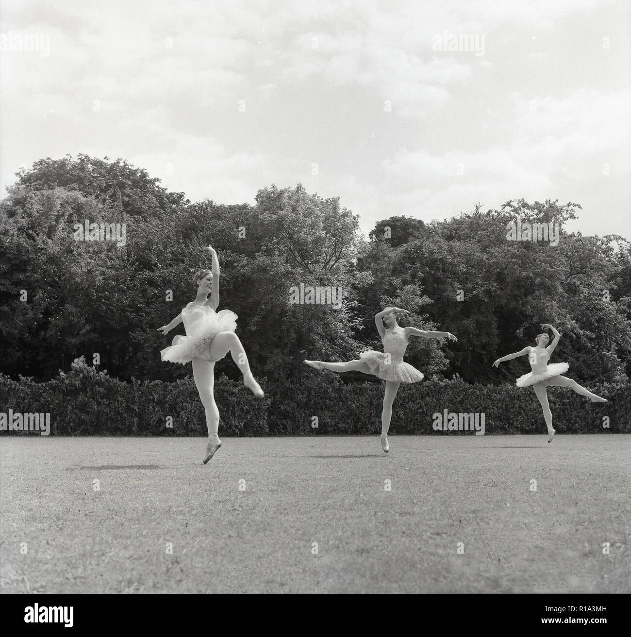 1967, Tring Arts Festival, female ballet dancers performing outside at the Arts Educational School, an independent co-educational school, specialising in dance, the sister school of the London one. It was founded in 1939 and in 1945 moved to Tring Park Mansion owned by the Rothschild family and was originally known as the Cone-Ripman school. In 2009 the school was renamed as the Tring Park School for the Performing Arts, and became independent of the London one. Stock Photo