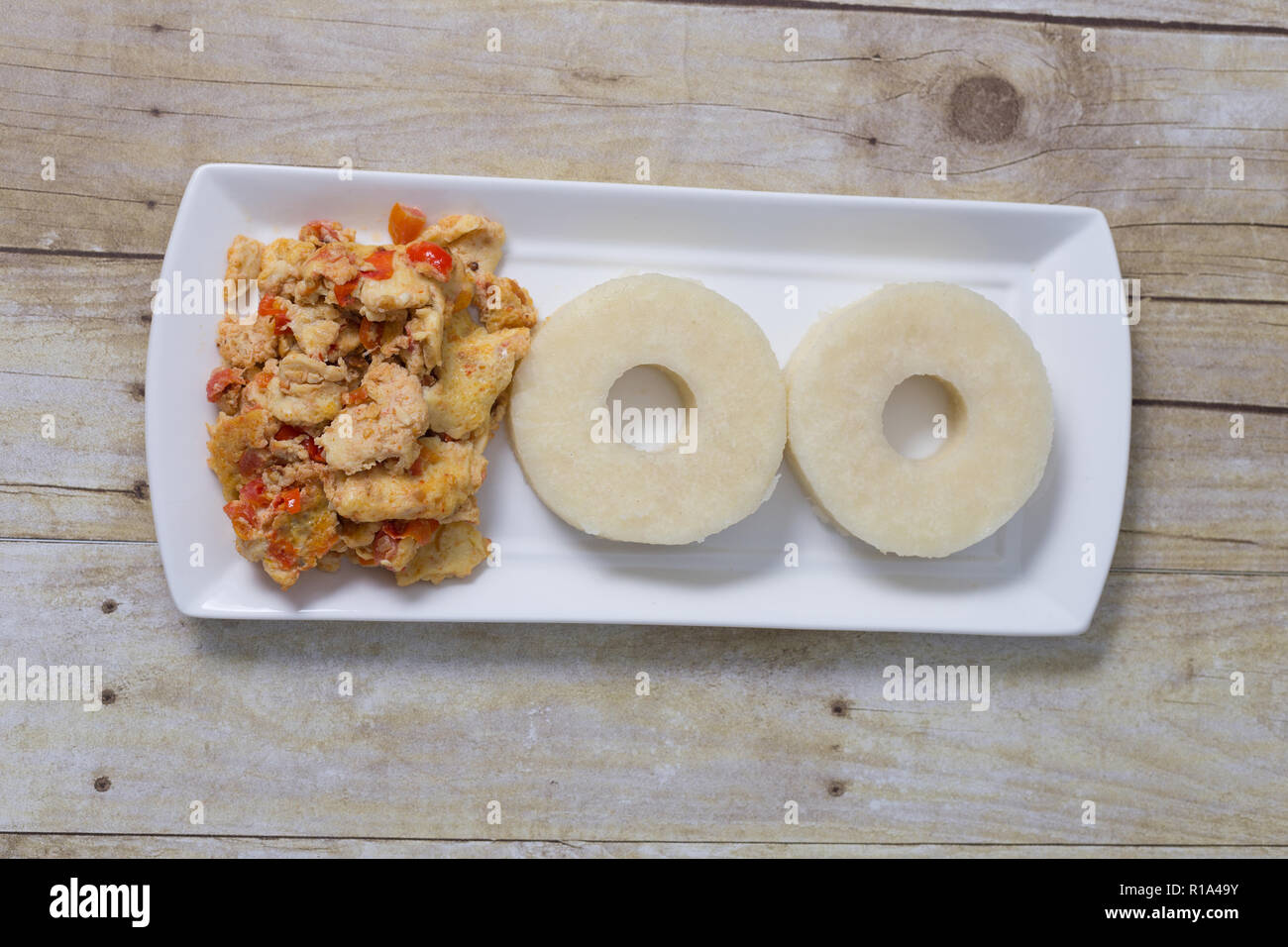 Yam and fried egg source Stock Photo