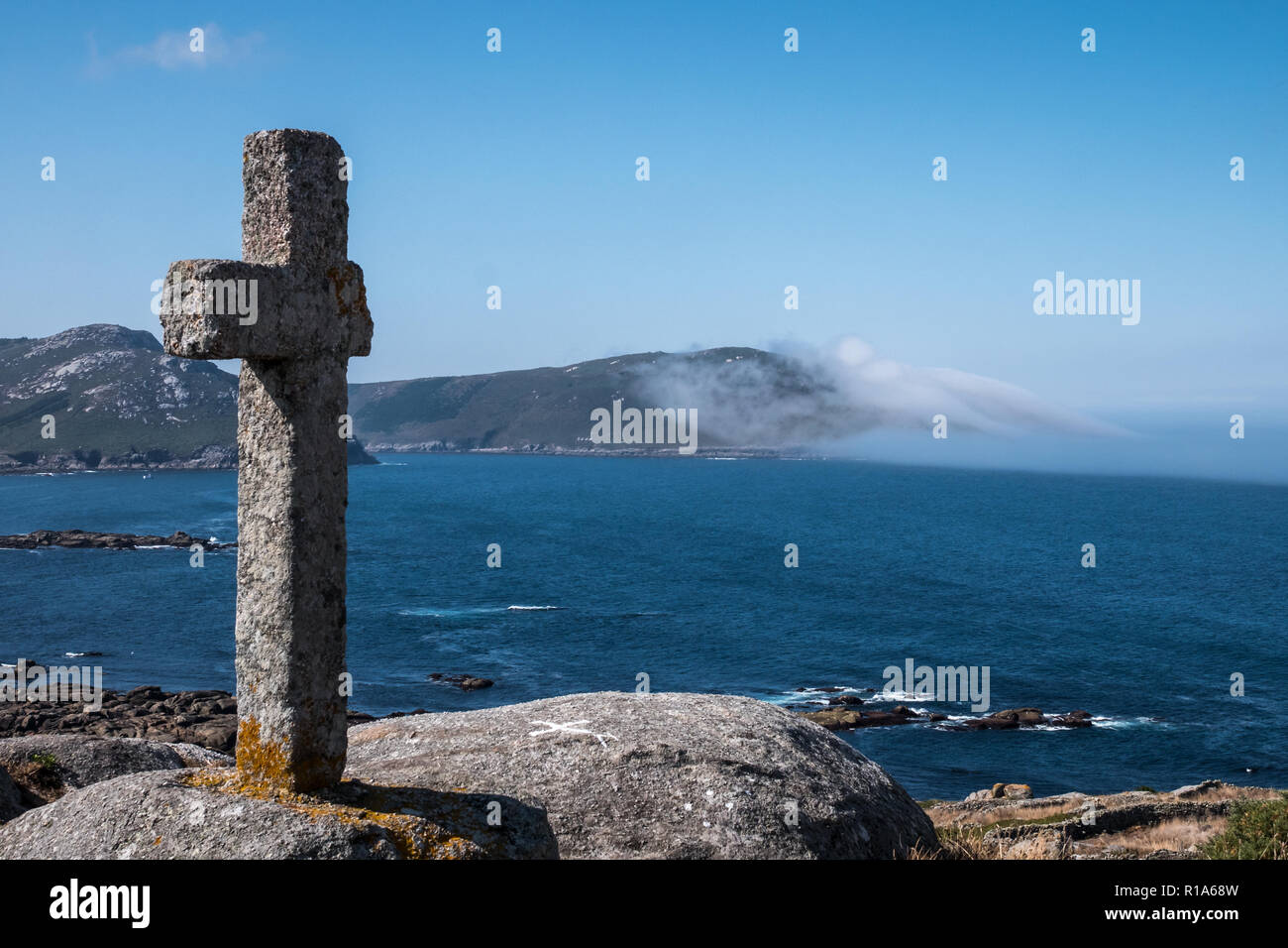 Broken granite cross on the summit of Mount Corpino in Muxia, Galicia, Spain Stock Photo