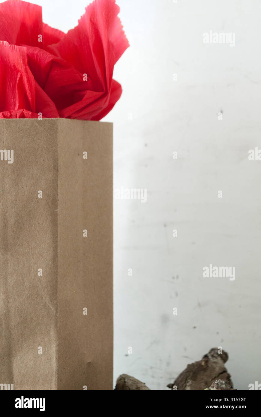 background of red gift paper bag detail with white background Stock Photo
