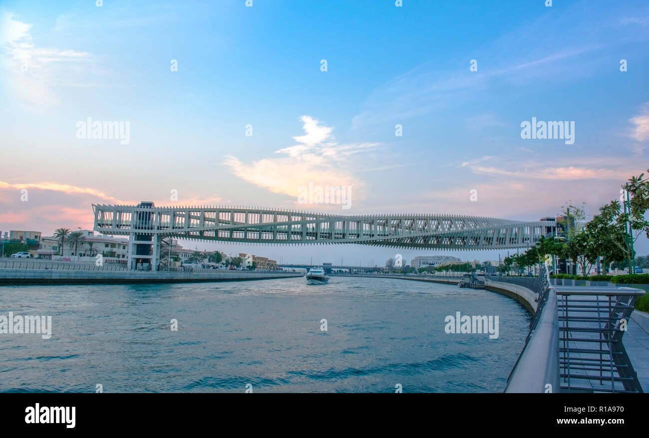 Spiral Bridge over Water canal Dubai New Attraction, Modern architecture Design Stock Photo
