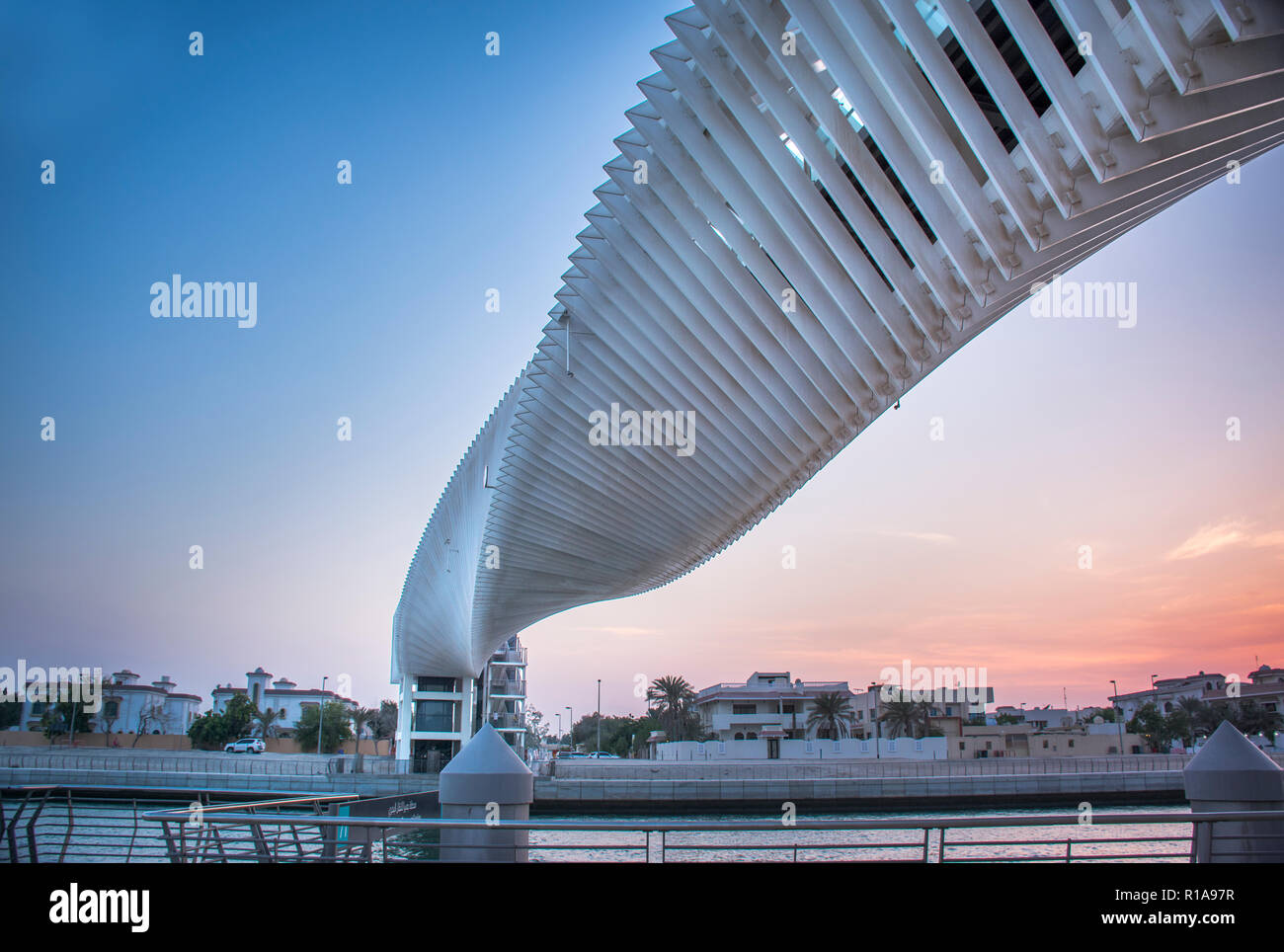 Spiral Bridge over Water canal Dubai New Attraction, Modern architecture Stock Photo