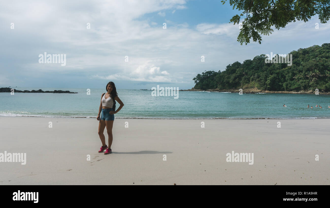 Attractive Travel woman at the Beach at manuel antonio national park Stock Photo