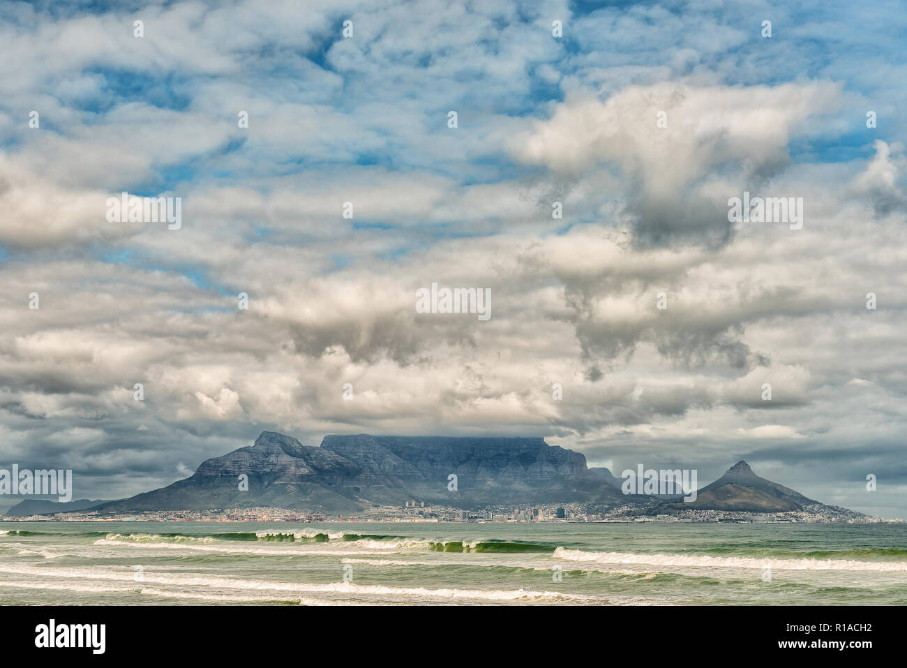 The Cape Town Central Business District and Table Mountain as seen across Table Bay from Bloubergstrand Stock Photo