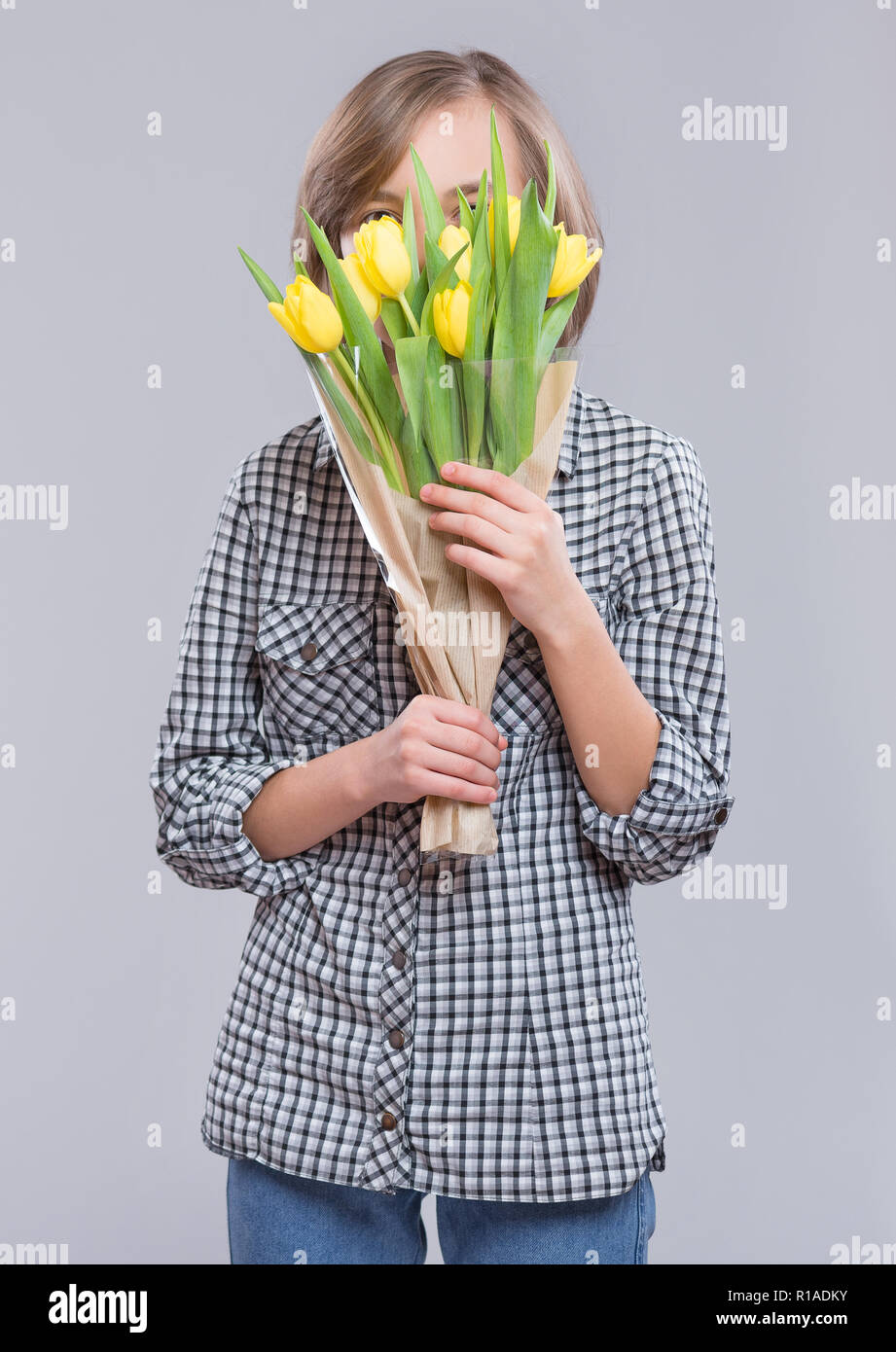 Teen girl with flowers Stock Photo