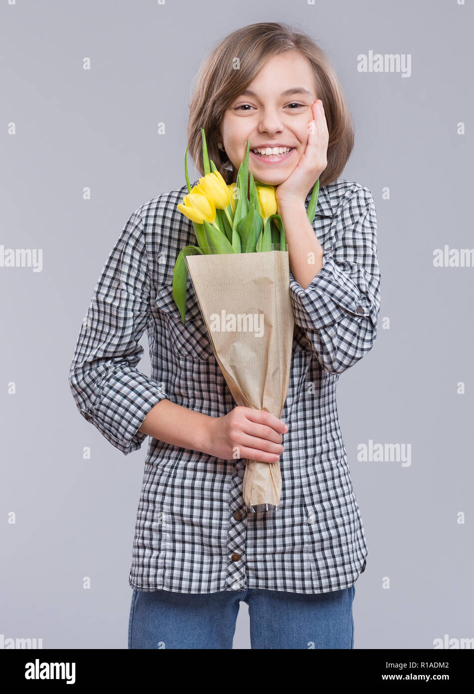 Teen girl with flowers Stock Photo