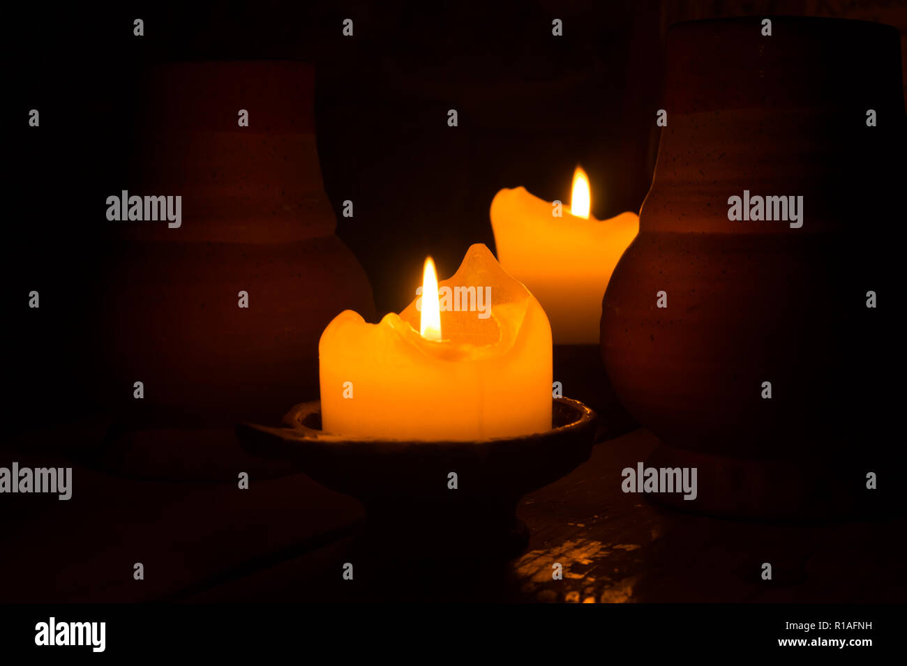 Burning candle in the dark Stock Photo Alamy