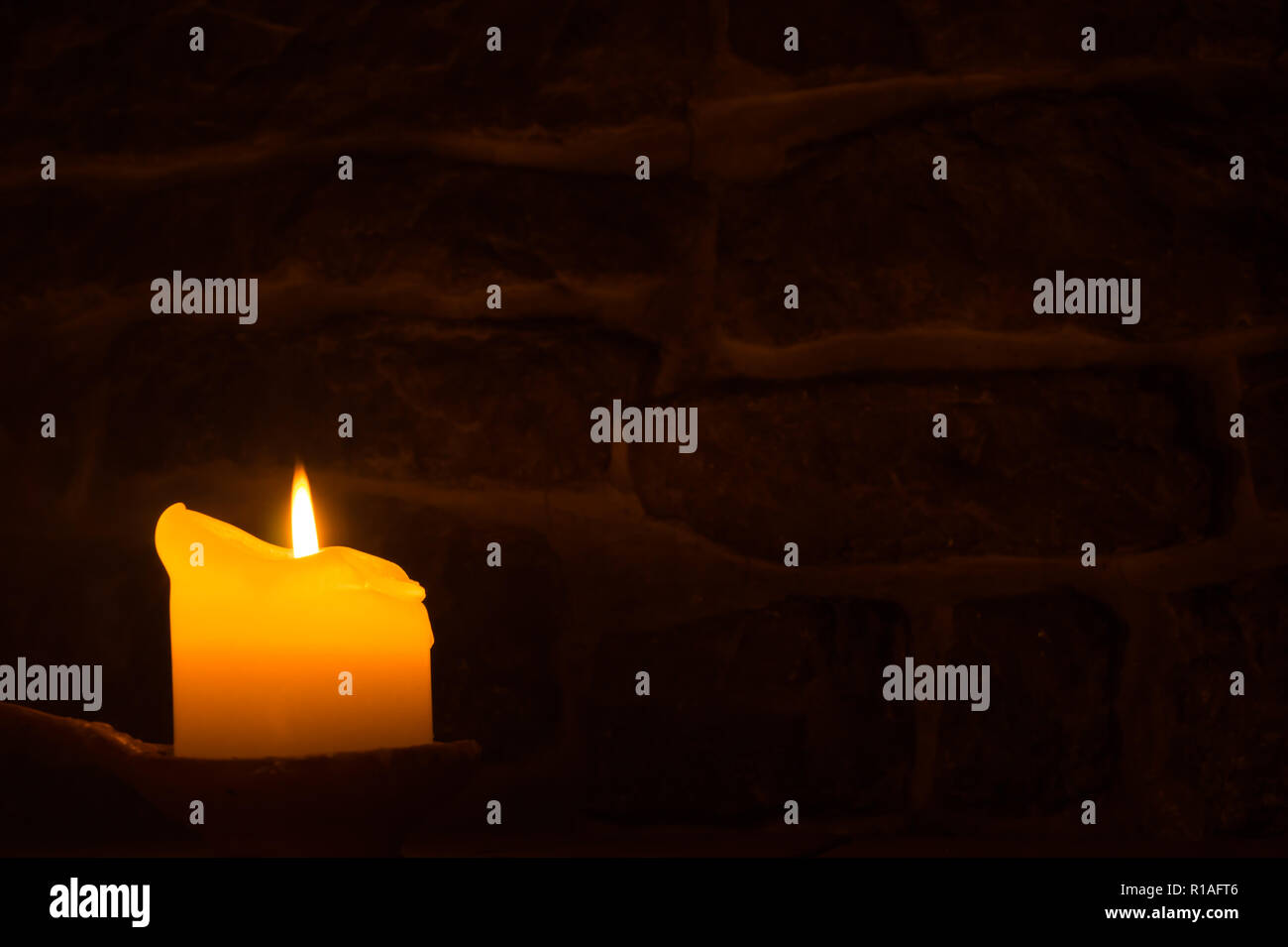 Burning candle in the dark Stock Photo Alamy