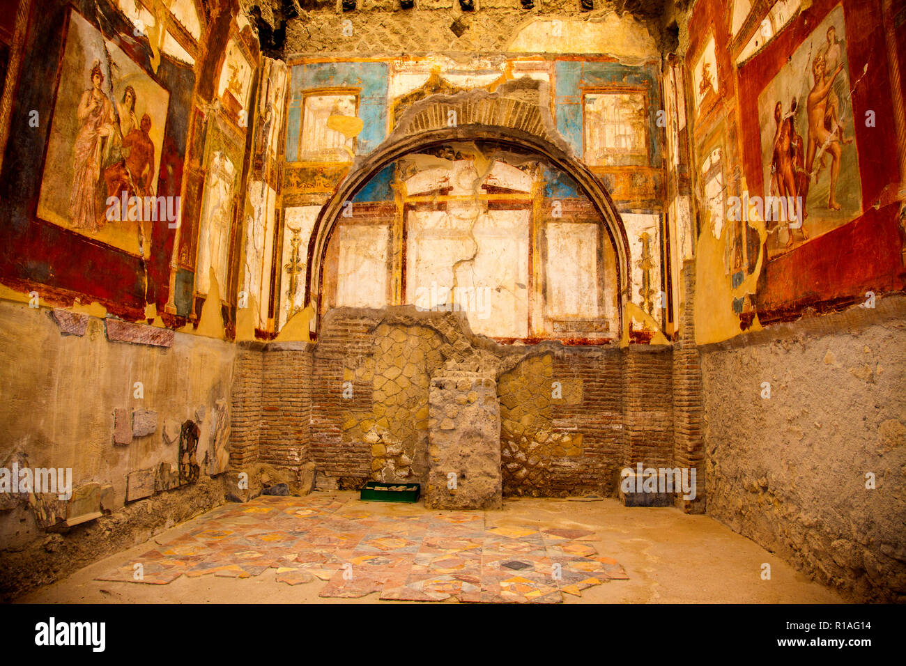 Sede degli Augustali with its frescoed walls at Herculaneum in Italy. Stock Photo