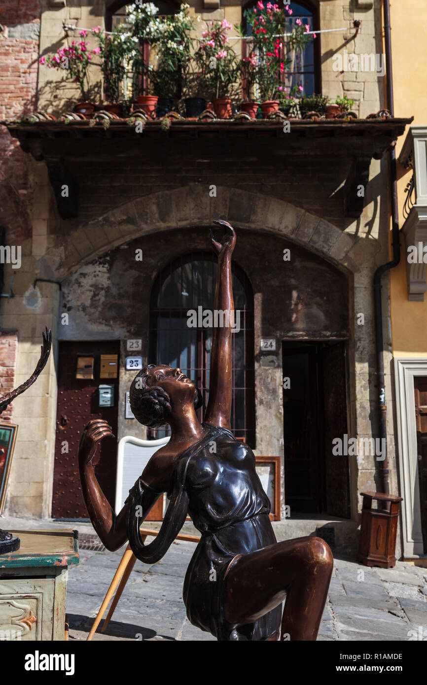 1930s bronze antique statue, Arezzo market, Tuscany, Italy Stock Photo