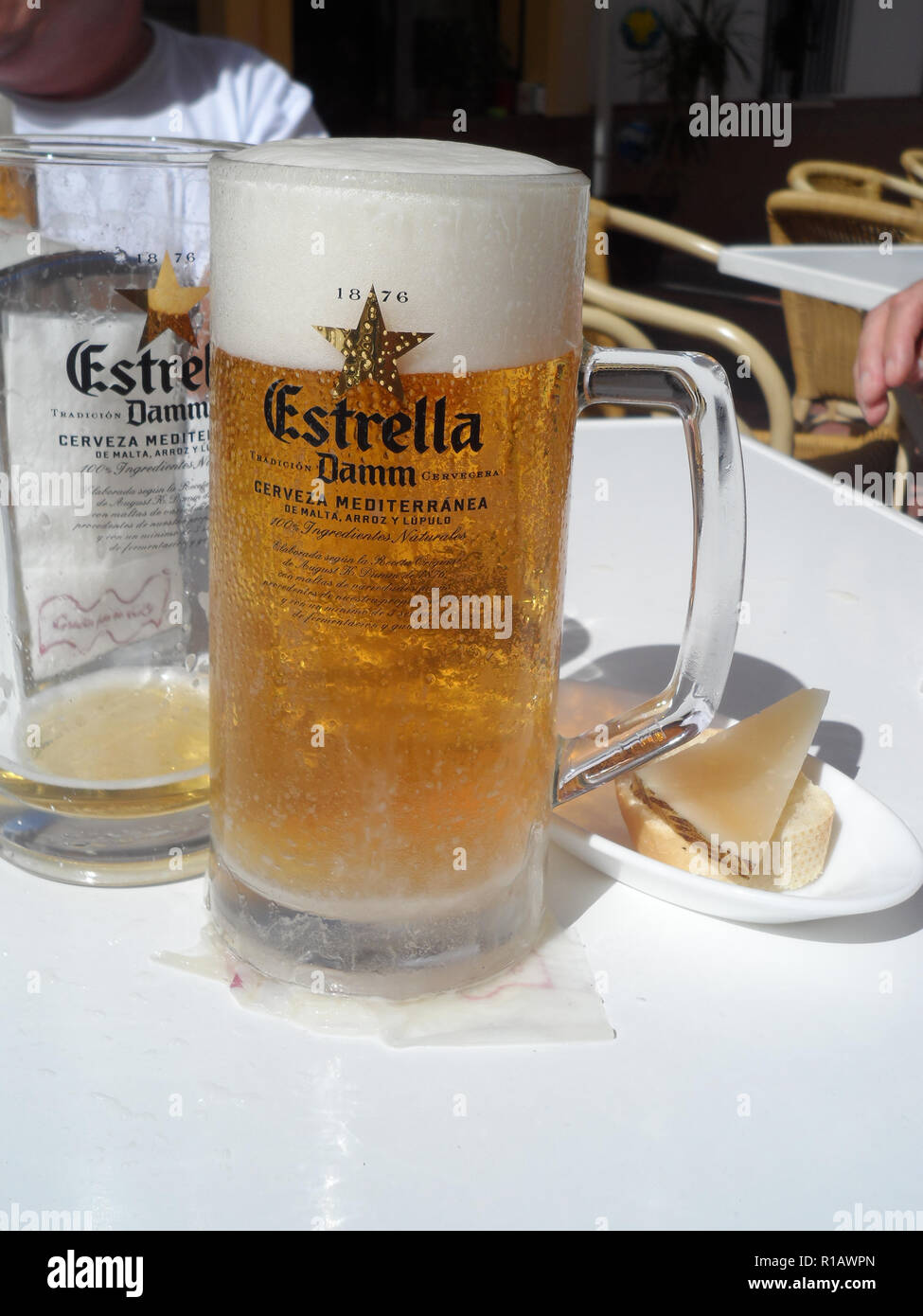 A cold fresh pint of Estrella Damm pilsner beer served in a tapas bar in Fuengirola, Costa del Sol, Spain. Stock Photo
