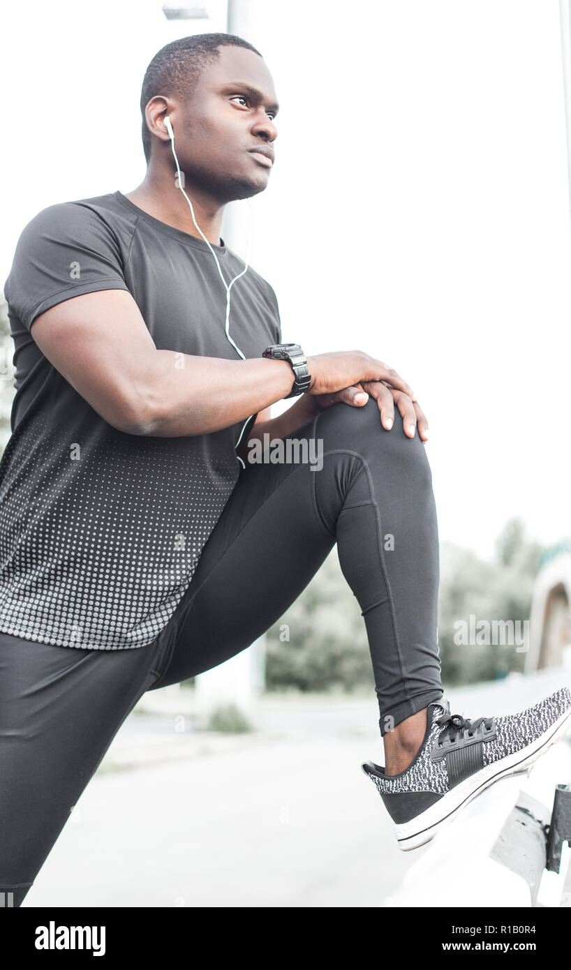 African american men stretching hi-res stock photography and images - Alamy