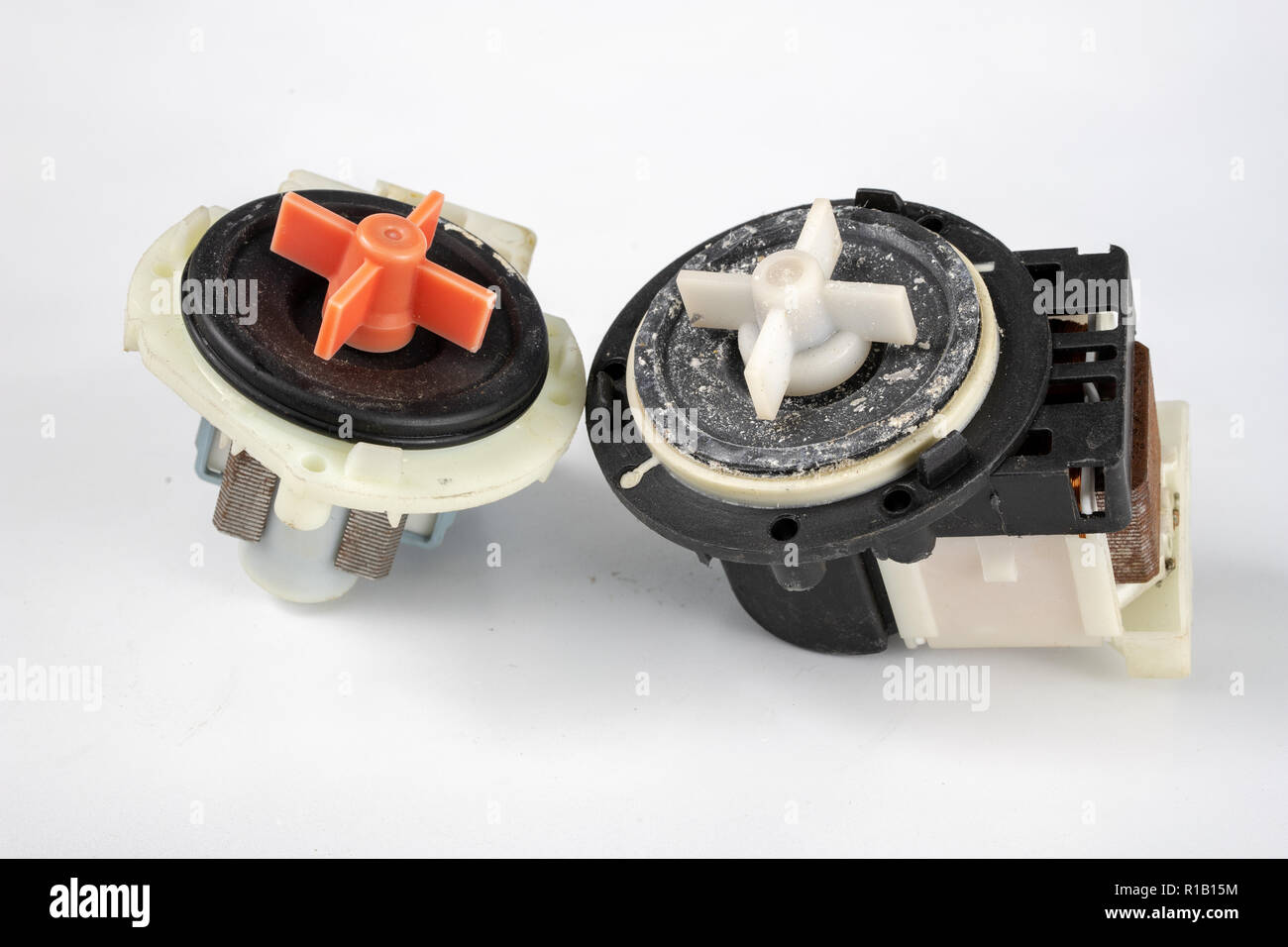 Old washing machine pump. Spare parts for household appliances. Light