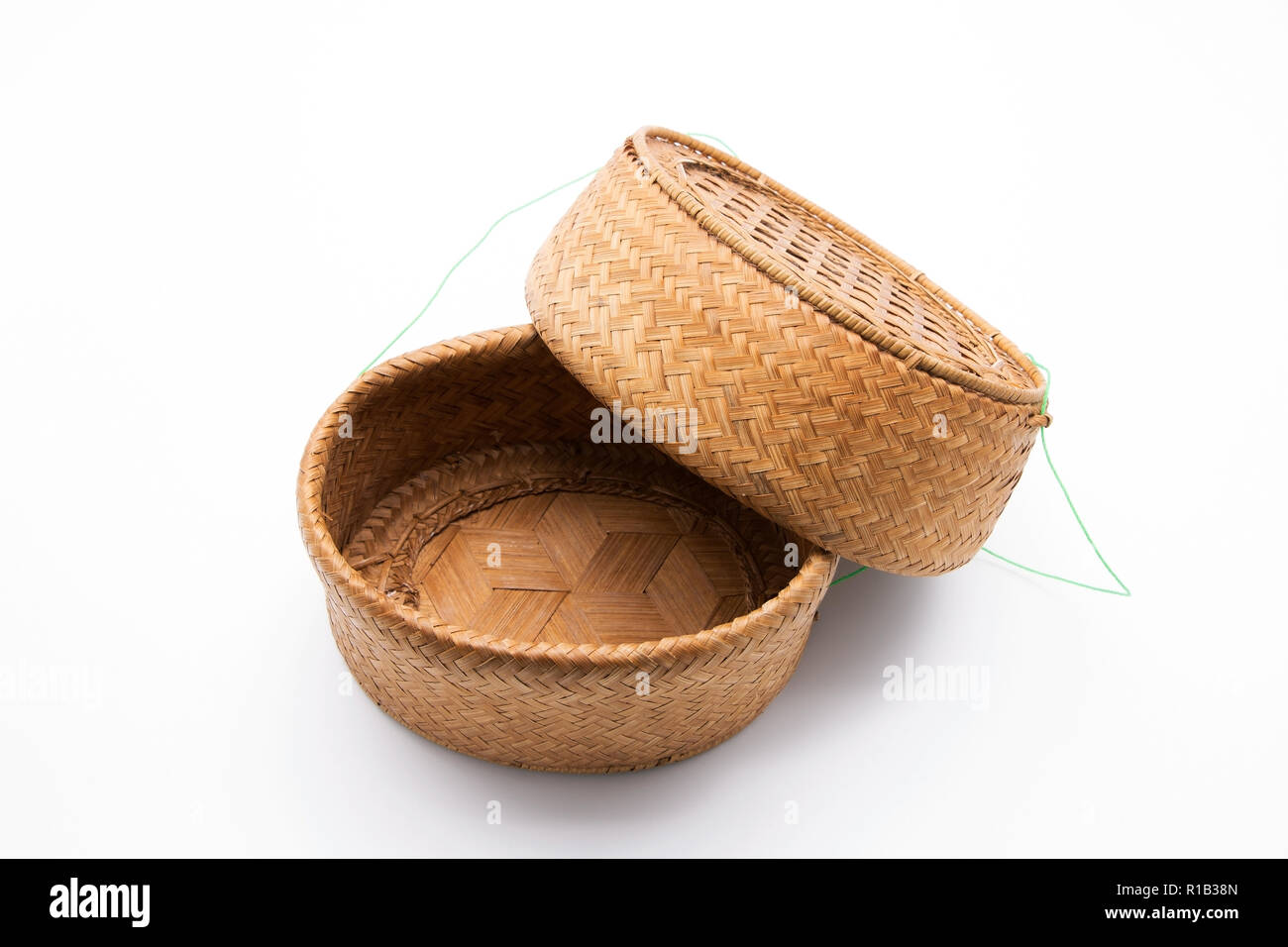 Closeup Bamboo Wicker Basket with Lid (Rice Basket) Isolated on White Background Stock Photo