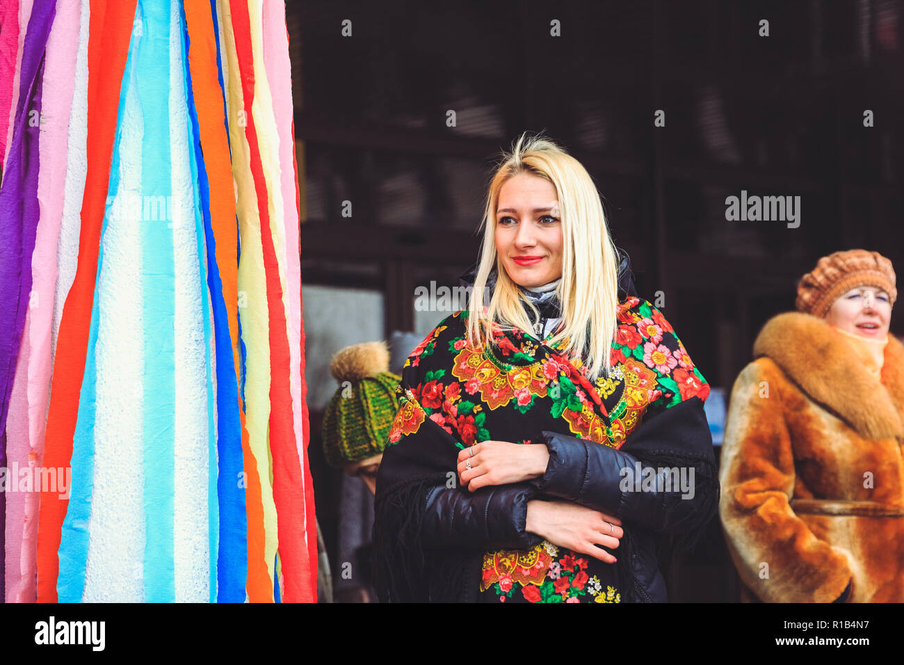 Gomel, Belarus - February 18, 2018: Beautiful young woman in Belarusian shawl at the Shrovetide fair in Gomel Stock Photo
