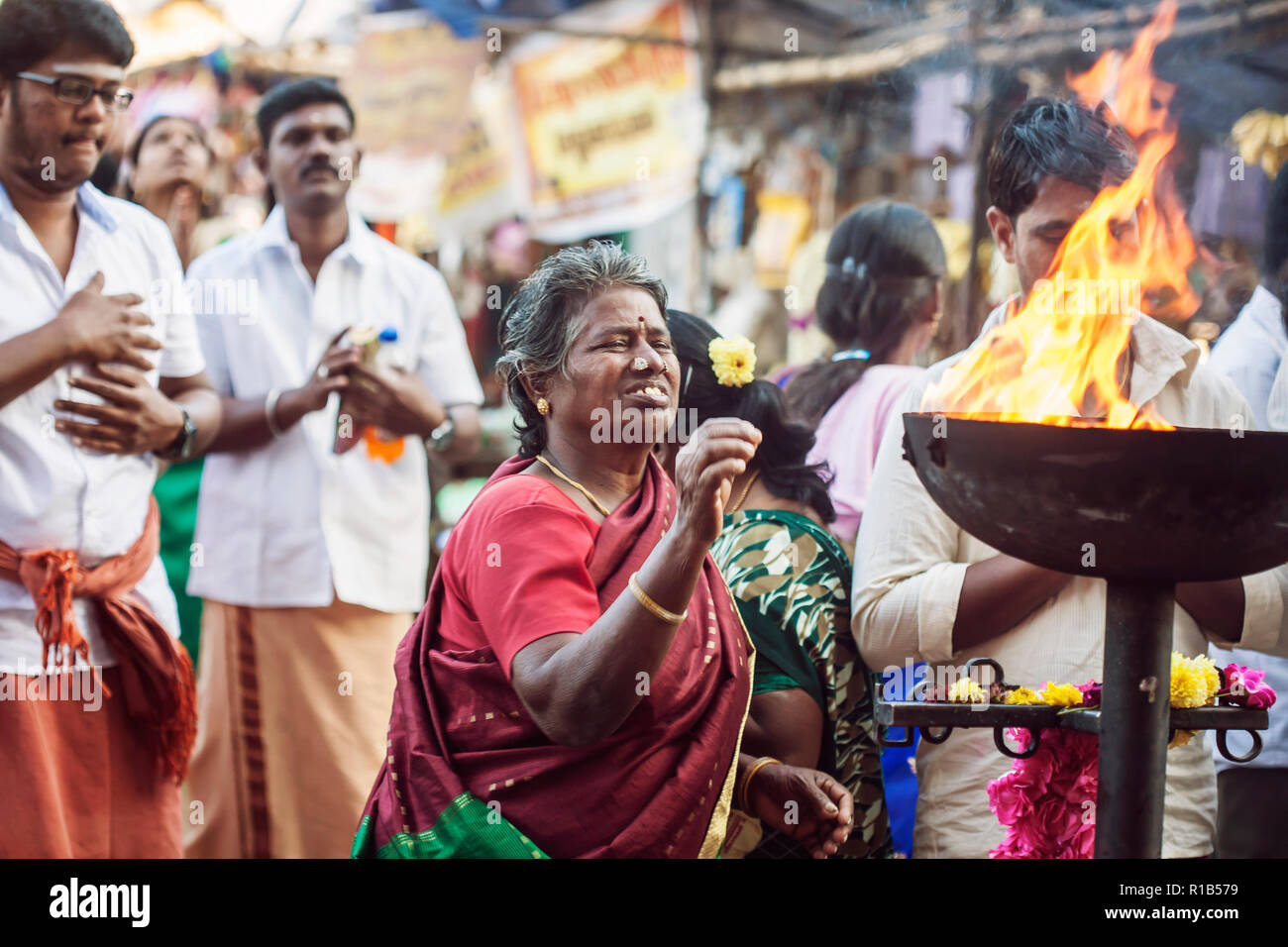 Tiruvannamalai in Tamil Nadu, India, January 31, 2018: People praying in front of the Tiruvannamalai temple Stock Photo