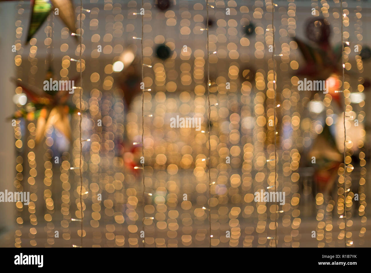 curtain of fairy lights LED in a Christmas decoration Shopping mall artistic abstract photo