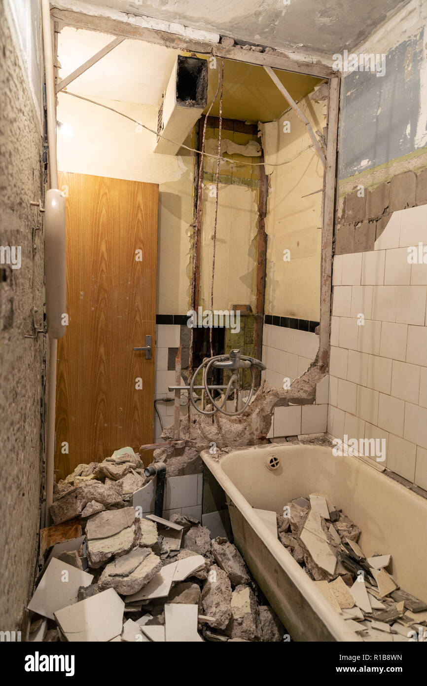 old bathroom interior before complete reconstruction Stock Photo