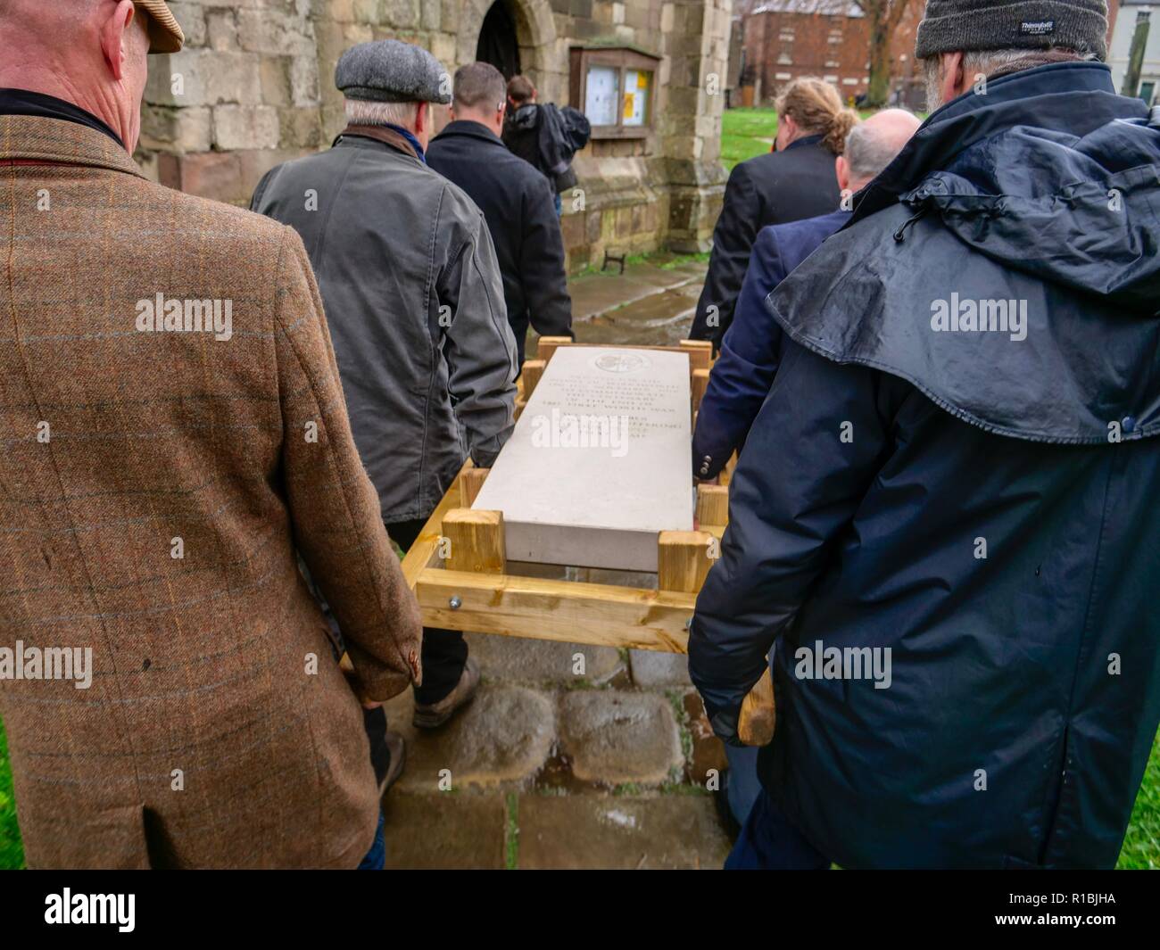 Wirksworth Derbyshire, UK. 11th Nov, 2018. , WW1 remembered a hundred years on, headstone made & engraved in Middleton by Wirksworth from Hopton Wood stone by Colin Julian of L Petts stonemasons being carried by horse drawn carriage to St. Mary's Church in Wirksworth. Credit: Doug Blane/Alamy Live News Stock Photo