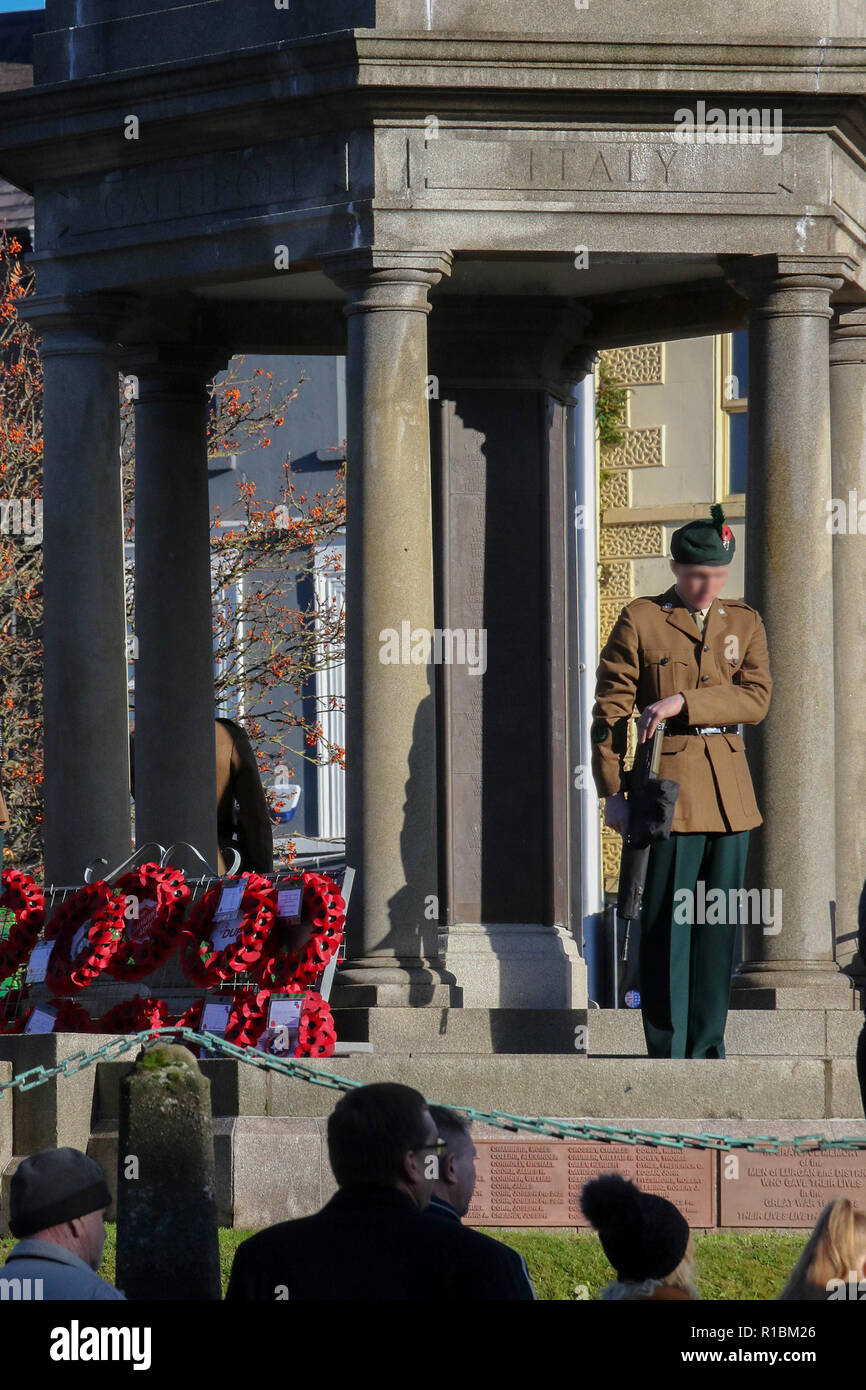 Lurgan, County Armagh, Northern Ireland, UK. 11 November 2018. Remembrance Day at The War Memorial  in Lurgan which this year also marked the centenary of Armistice Day on 11 November 1918. Credit:CAZIMB/Alamy Live News. Stock Photo