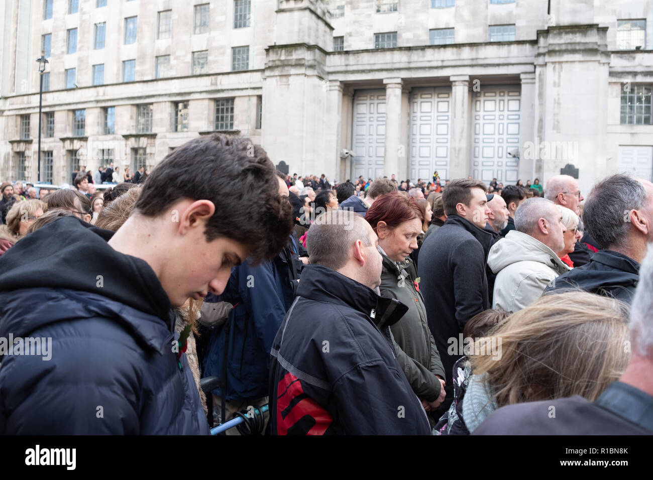 London UK, 11th November 2018: Long queues of people attending the National Service of Remembrance at the Cenotaph in London on Remembrance Sunday. Credit: On Sight Photographic/Alamy Live News Stock Photo