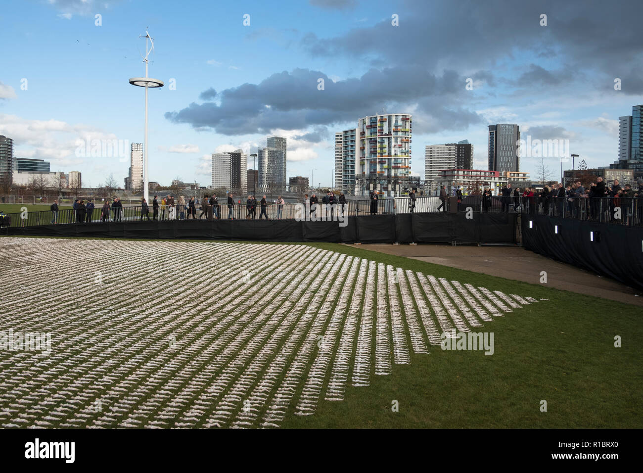 Stratford, London, UK. 11th November 2018. The Artist Rob Heard's installation representing the fallen soldiers from the First World War. Tens of thousands of shrouded figures  laid out at London's Olympic Park to mark the centenary of the end of World War One. Each handmade 12-inch model represents one of the 72,396 British Commonwealth serviceman killed at the Somme with no known grave.  In total, more than one million soldiers were killed or wounded during the 1916 Battle of the Somme.. Credit: Mike Abrahams/Alamy Live News Stock Photo