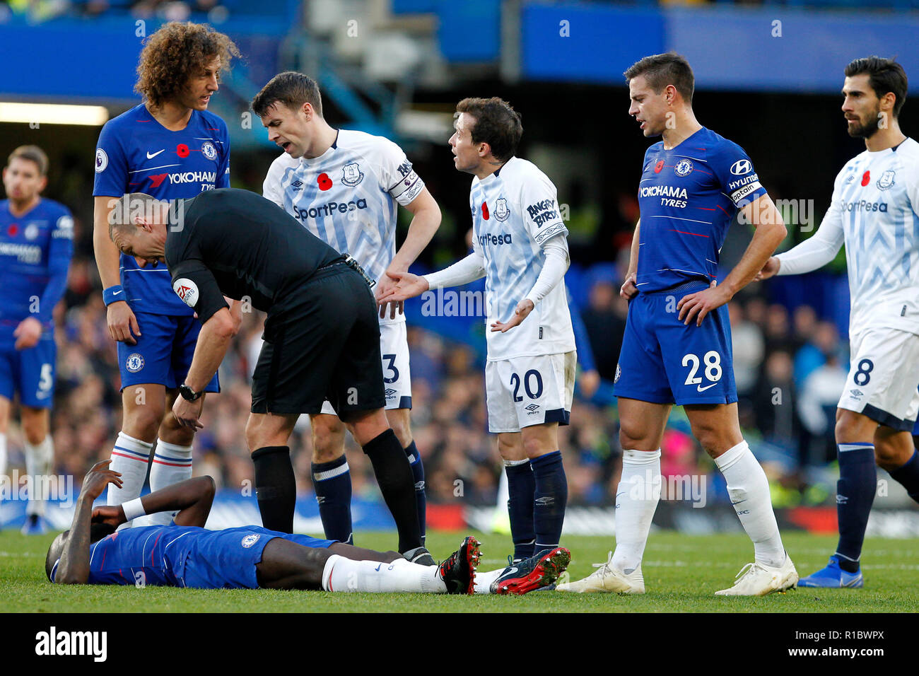 London, UK. 11th Nov 2018. Bernard of Everton tells David Luiz of Chelsea he did nothing as Antonio Rüdiger lays on the floor during the Premier League match between Chelsea and Everton at Stamford Bridge, London, England on 11 November 2018. Photo by Carlton Myrie.  Editorial use only, license required for commercial use. No use in betting, games or a single club/league/player publications. Credit: UK Sports Pics Ltd/Alamy Live News Stock Photo