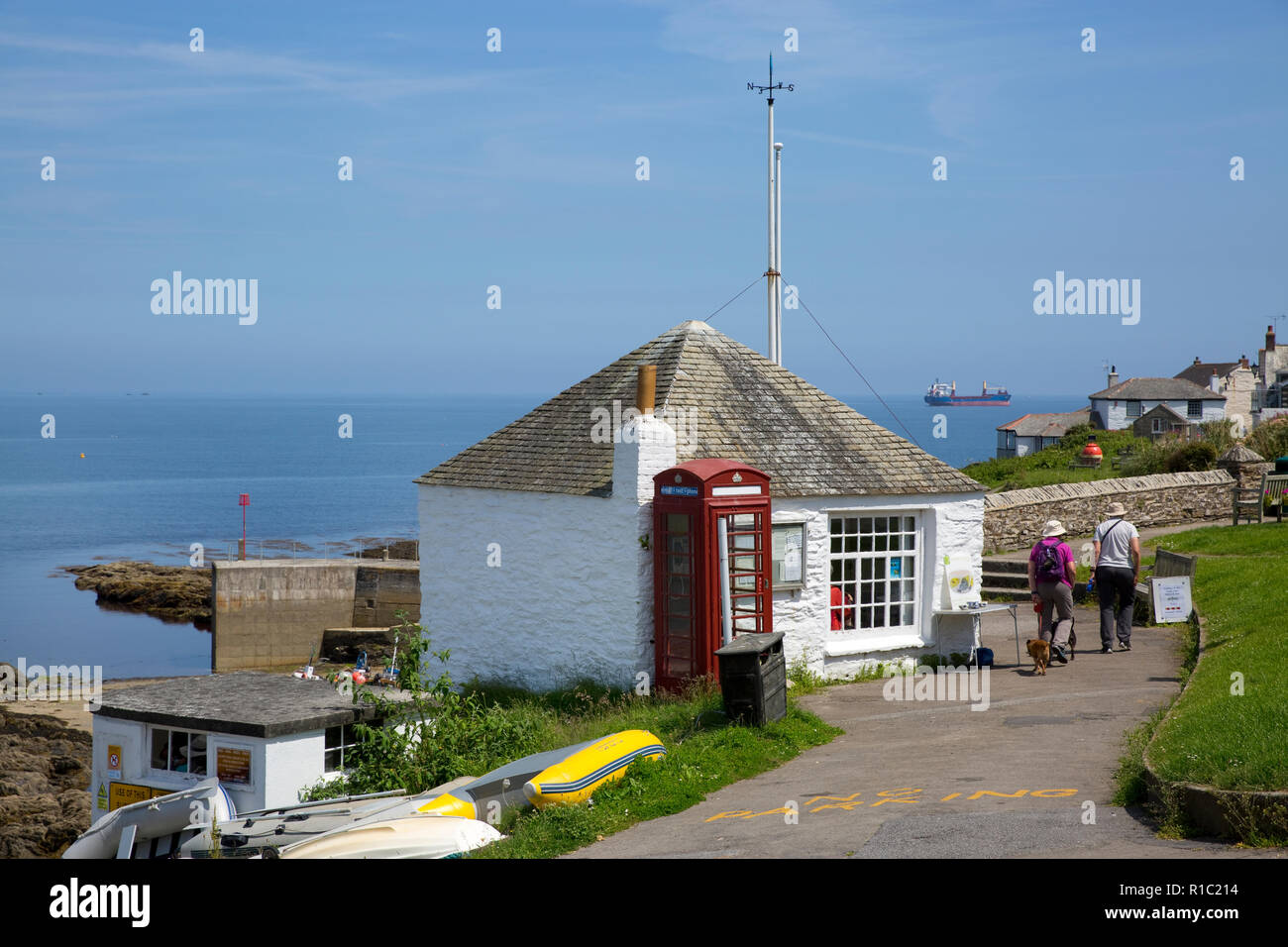 The old lifeboat station and coastal path, Portscatho, Cornwall, England Stock Photo