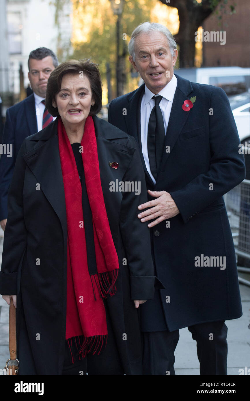 Former Prime Minister Tony Blair and his wife Cherie walk through Downing Street ahead of the remembrance service at the Cenotaph memorial in Whitehall, central London, on the 100th anniversary of the signing of the Armistice which marked the end of the First World War. Stock Photo