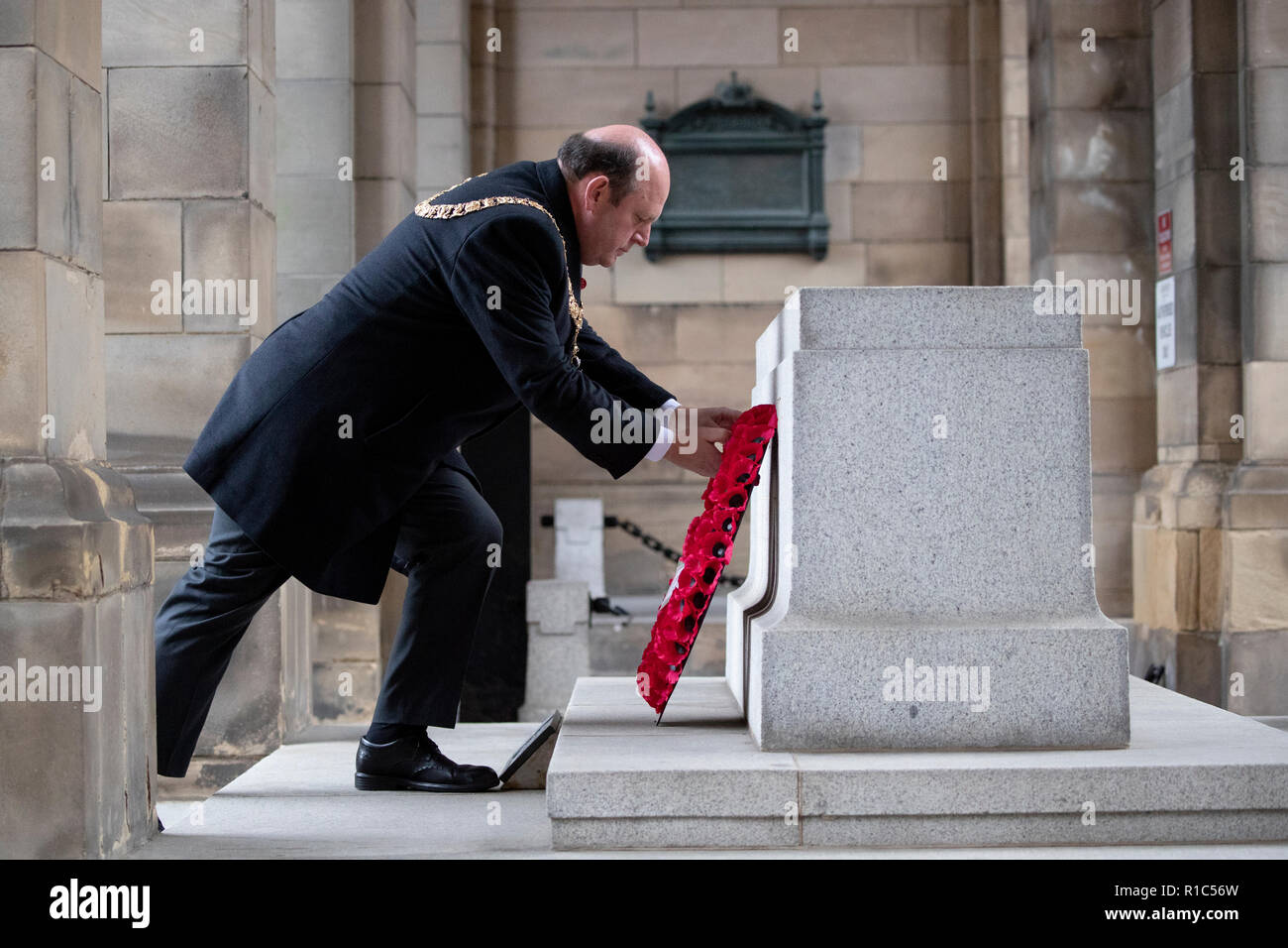 Lord Provost of Edinburgh Frank Ross lays a wreath at the Stone of Remembrance at the City Chambers, Edinburgh, on the 100th anniversary of the signing of the Armistice which marked the end of the First World War. Stock Photo