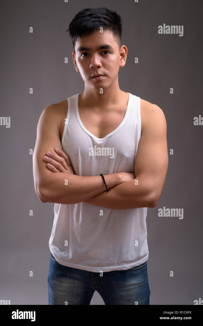 Man wearing tank top hi-res stock photography and images - Alamy