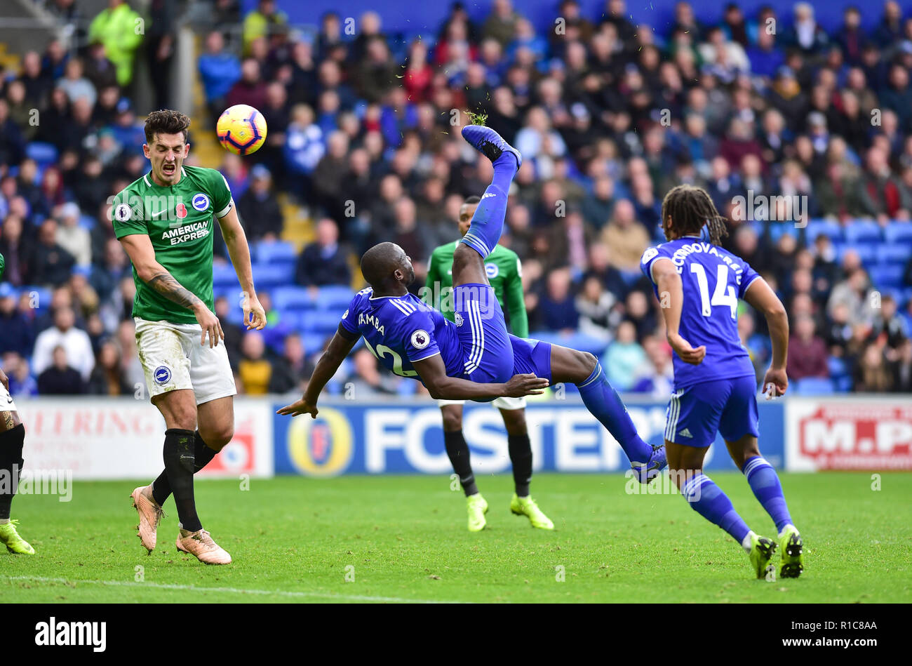 Sol Bamba  of Cardiff with his overhead kick which led to Cardiffs winner during the Premier League match between Cardiff City and Brighton and Hove Albion at the Cardiff City Stadium . 10 Nov 2018 Editorial use only. No merchandising. For Football images FA and Premier League restrictions apply inc. no internet/mobile usage without FAPL license - for details contact Football Dataco Stock Photo