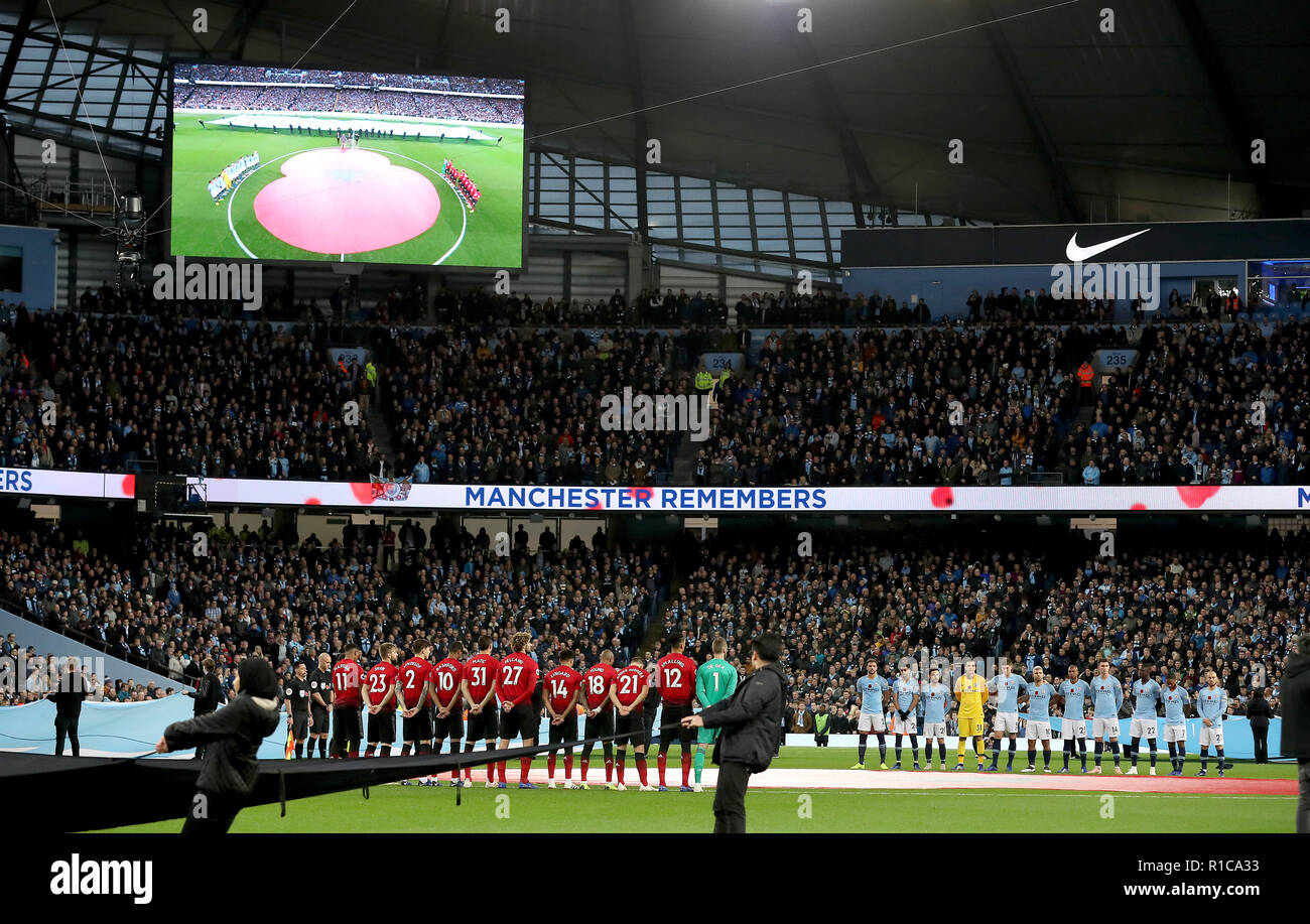 The two teams stand for a minute's silence for Remembrance Sunday