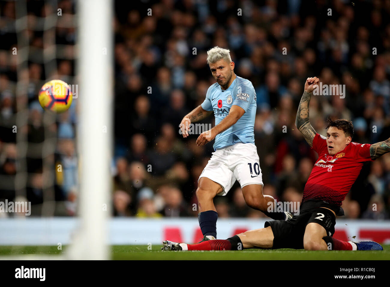 Manchester City's Sergio Aguero scores his side's second goal of the game during the Premier League match at the Etihad Stadium, Manchester. Stock Photo