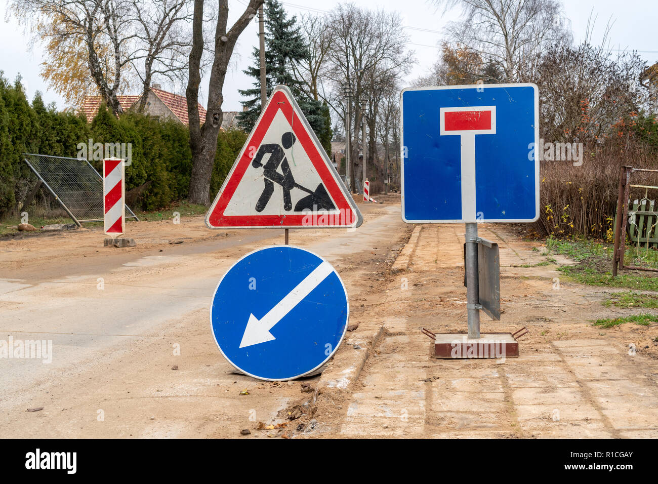 Road works sign for construction works in city street. Road under ...