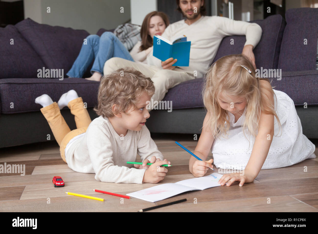 Young family with children spending free time together Stock Photo
