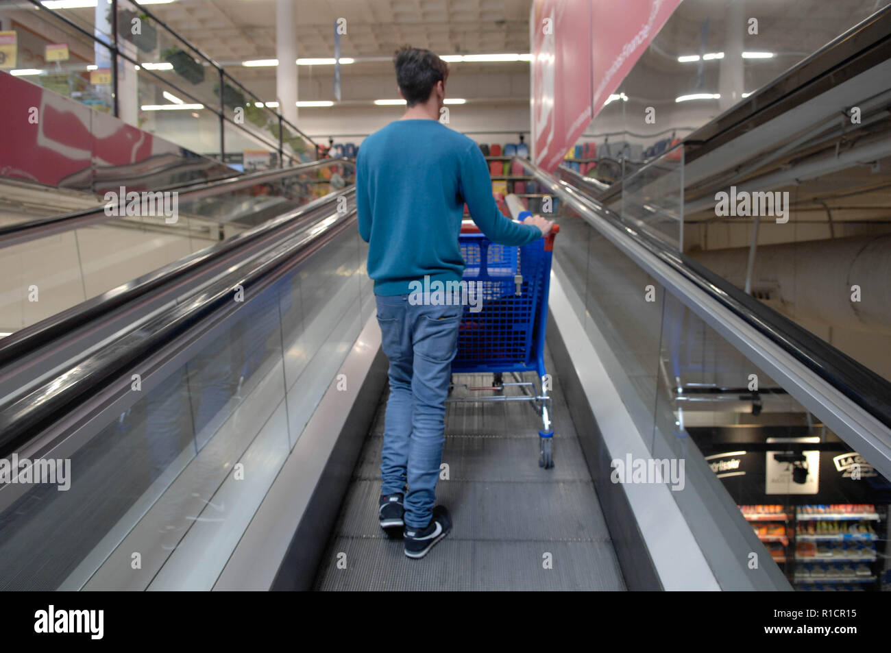 Shopping trolley escalator hires stock photography and images Alamy