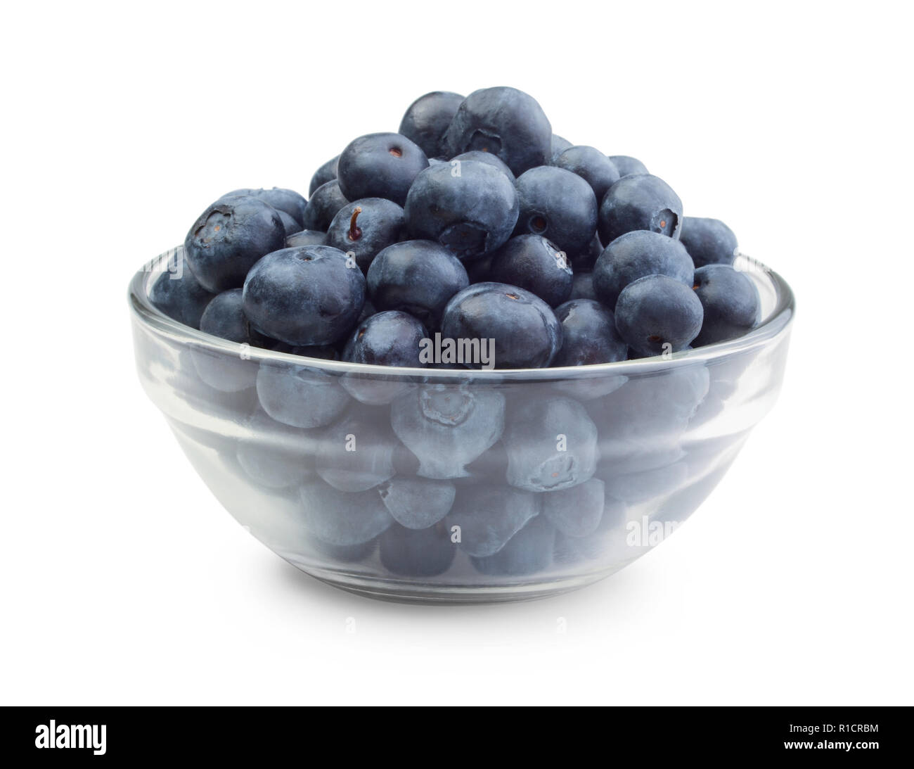 Blueberries in a glass bowl isolated on white background Stock Photo