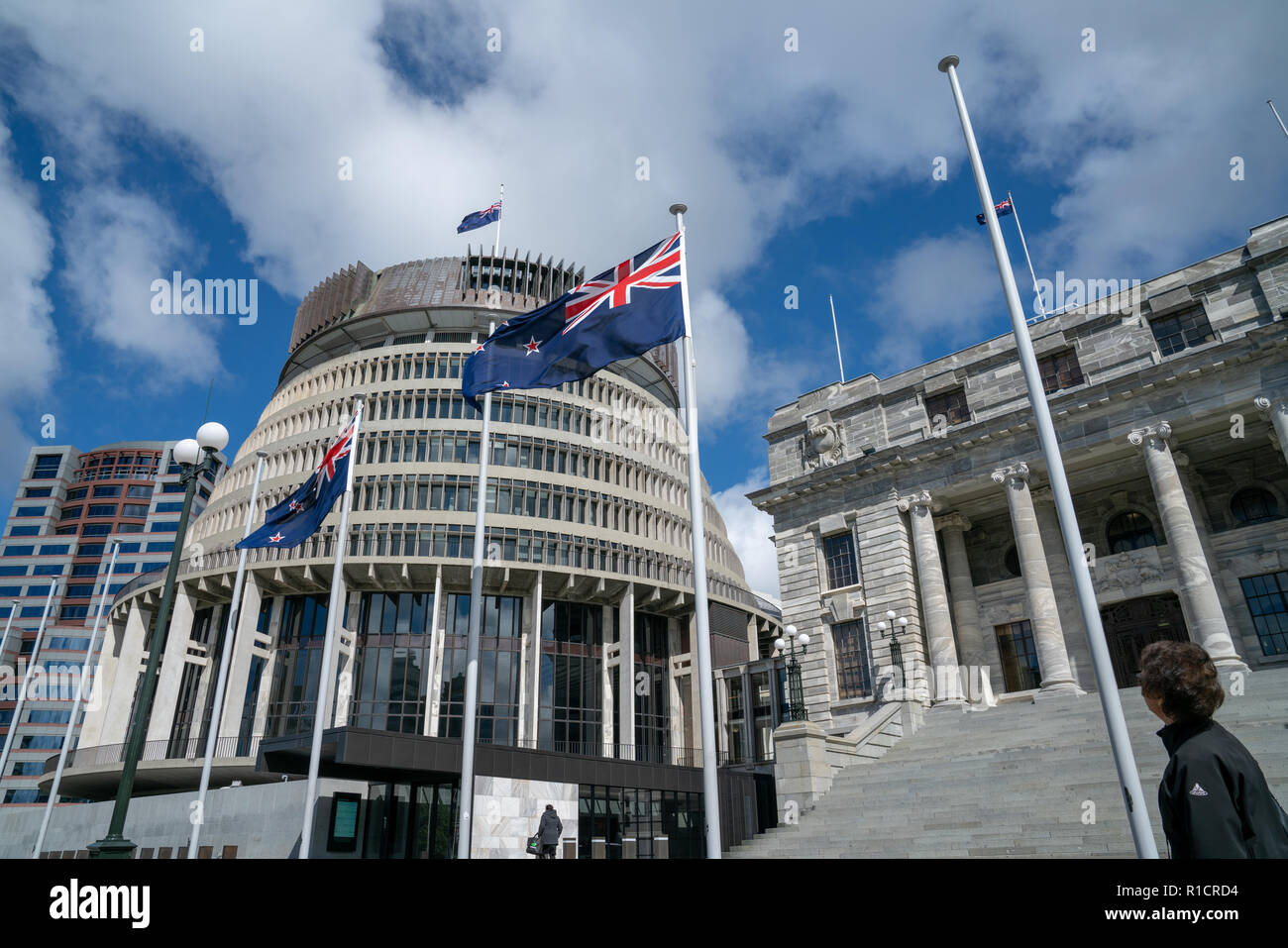 WELLINGTON NEW ZEALAND - OCTOBER 2 2018; Flags flutter in front New Zealand Government buildings, House neo classical style House of Parliament Stock Photo