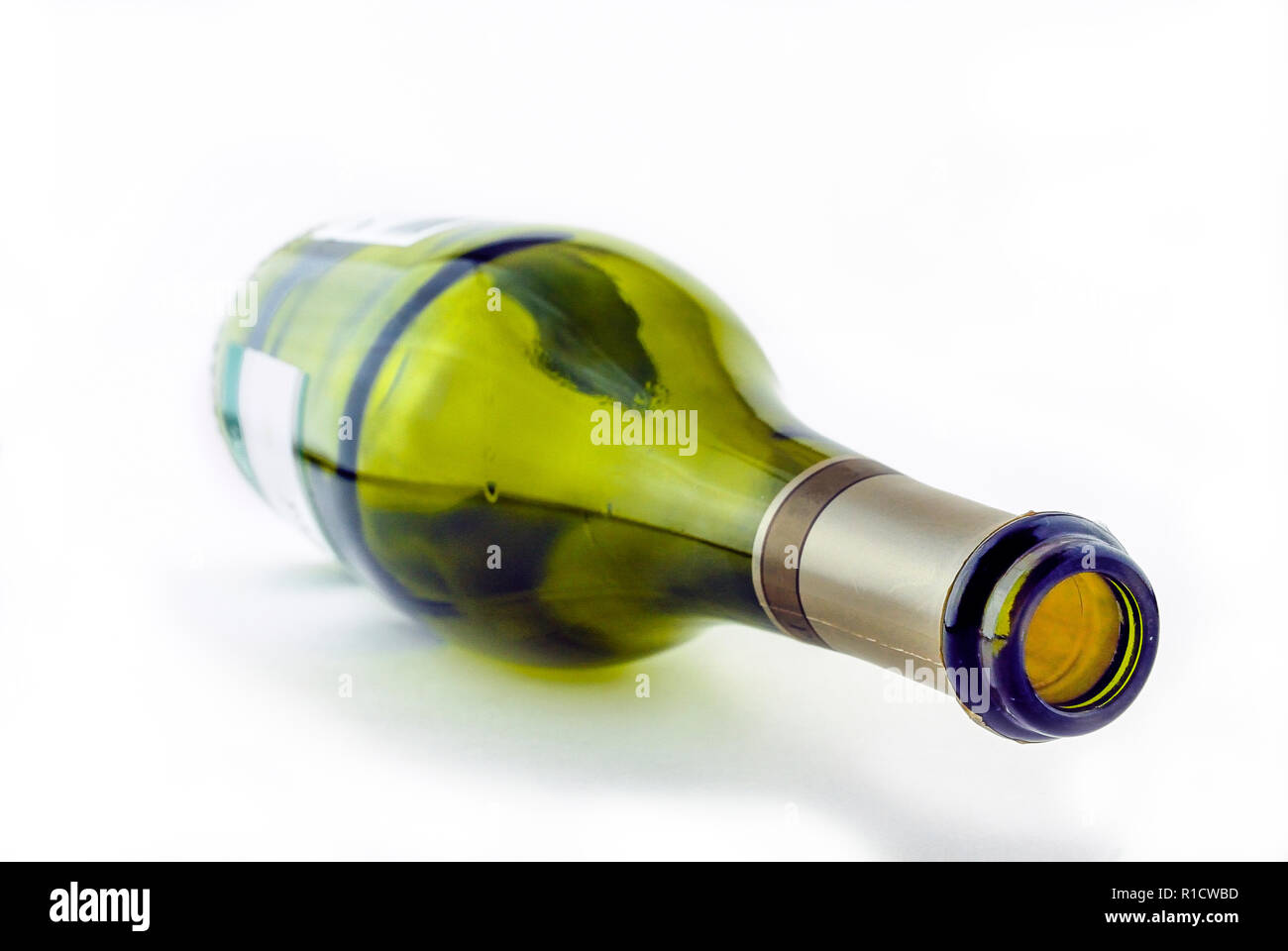 Empty wine bottle laying on its side Stock Photo Alamy