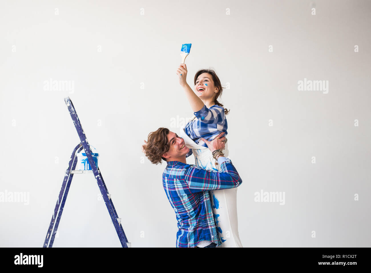 Renovation Repair And Family Concept Young Man Holds - 