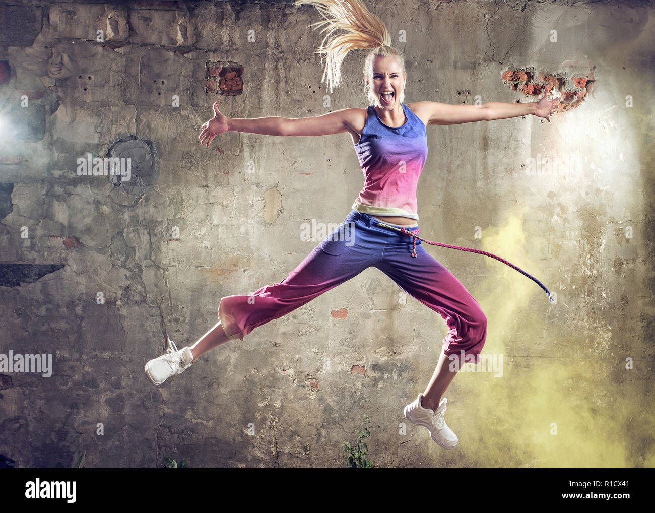 Blond woman dancing performance hi-res stock photography and images - Alamy