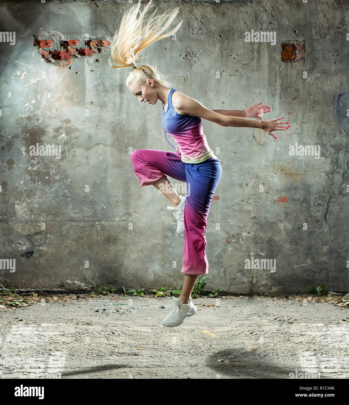 Blond woman dancing performance hi-res stock photography and images - Alamy