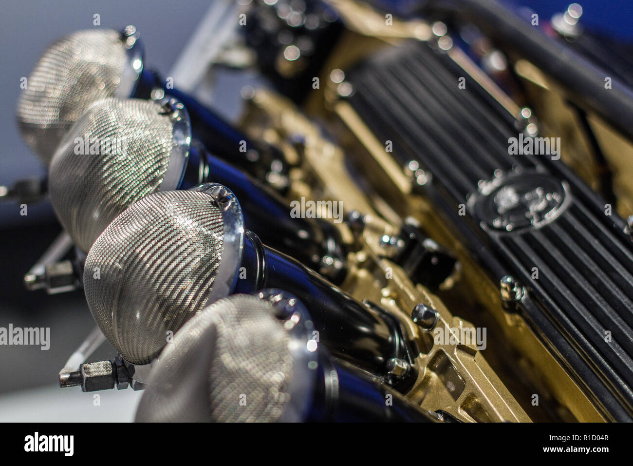 Close up of old sport engine with air filters on throttles Stock Photo