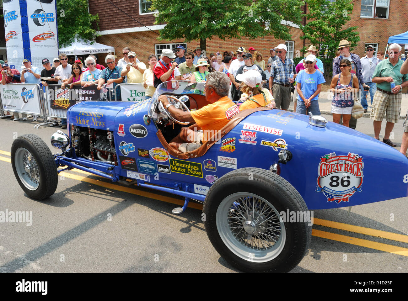 Drivers complete one lap of race in Fairport NY... Stock Photo