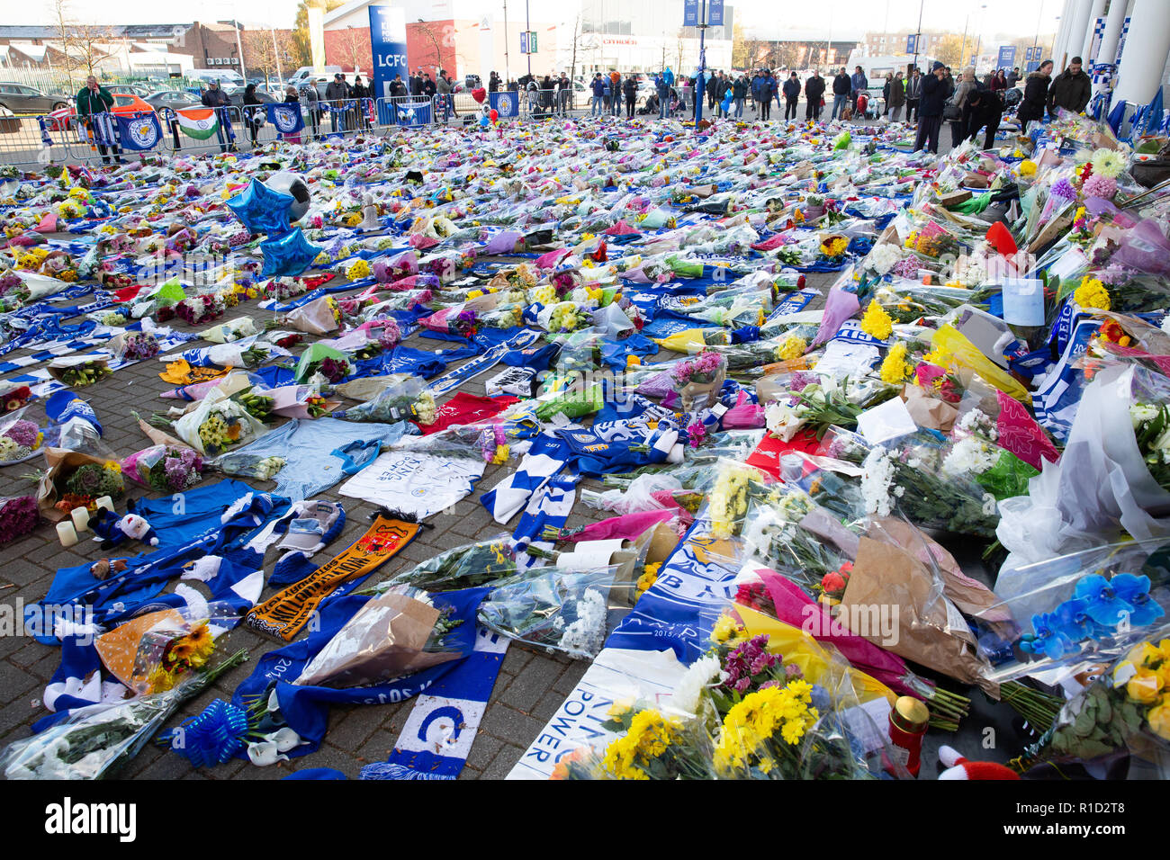 Leicester City Football fans paying their respects outside the stadium after the death of owner Vichai Srivaddhanaprabha in a helicopter crash. Stock Photo