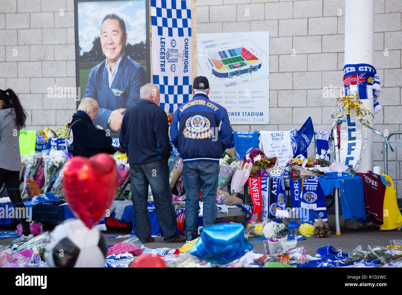 Leicester City Football fans paying their respects outside the stadium after the death of owner Vichai Srivaddhanaprabha in a helicopter crash. Stock Photo