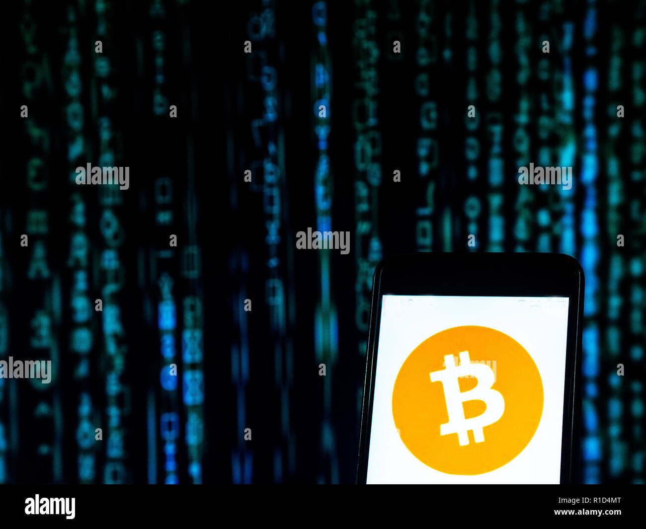 Bitcoin, Cash logo seen displayed on smart phone. Bitcoin is a  cryptocurrency, a form of electronic cash. It is a decentralized digital  currency without a central bank or single administrator that can