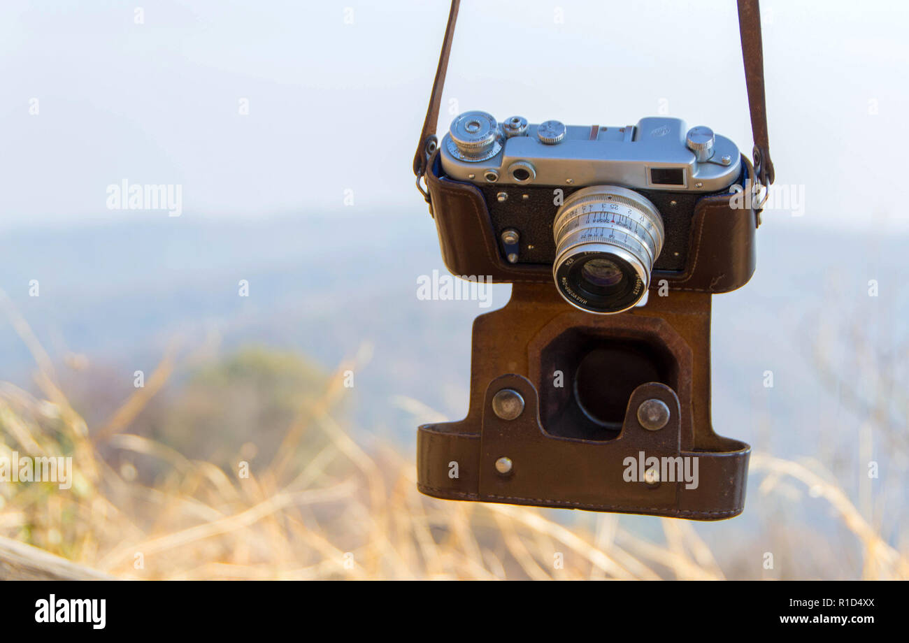 The old Soviet rangefinder film camera FED with manual rewinding of a film for photography. A 35