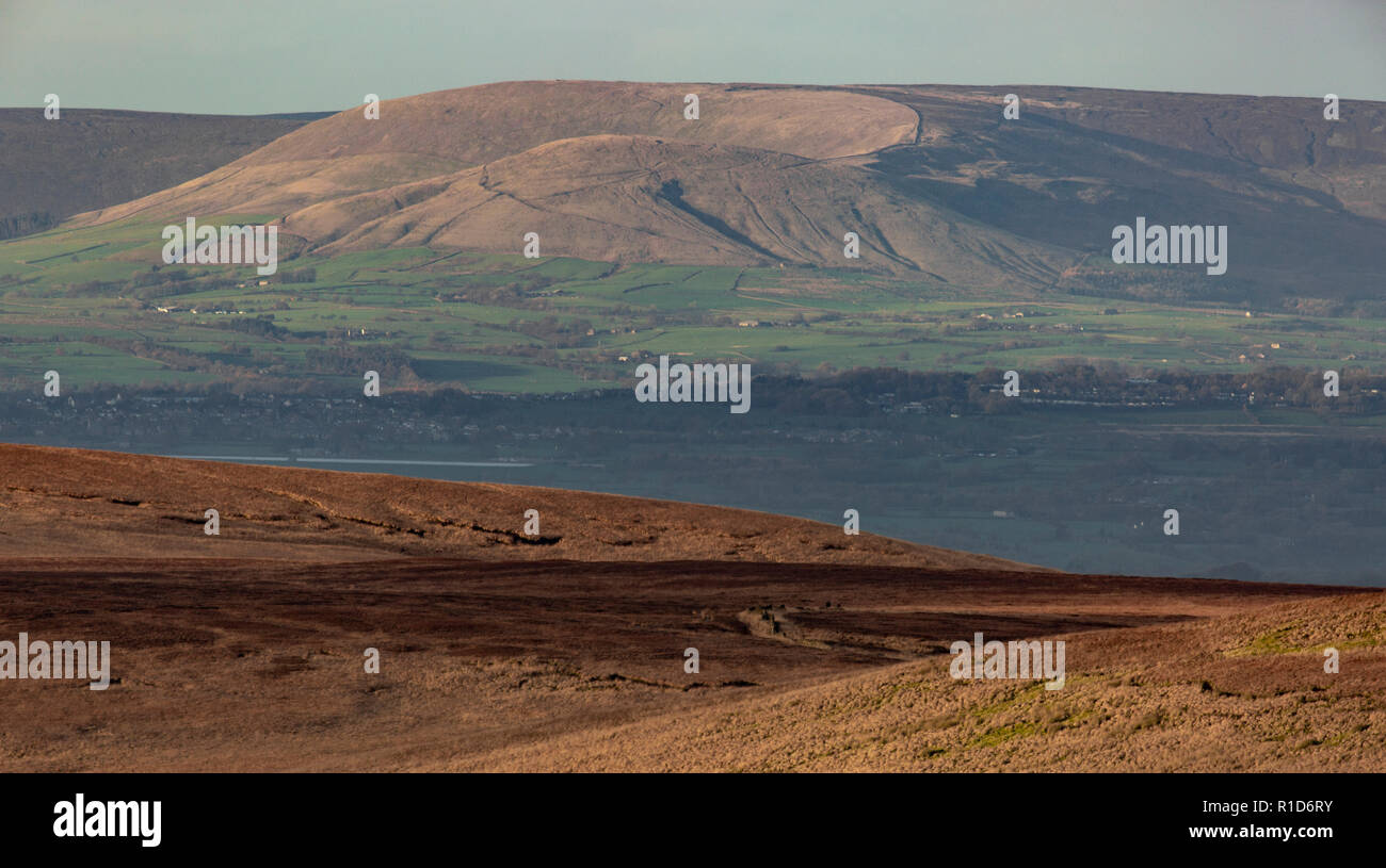 minimalist landscape of the West Pennine Moors with Autumnal colours and Parlick Pike and Fairsnape in the background viewed from the top Winter Hill. Stock Photo
